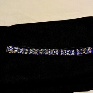 Faux diamond and sapphire headband.
